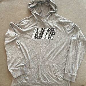 Long sleeve Nike hooded t shirt with front packet kids size XL